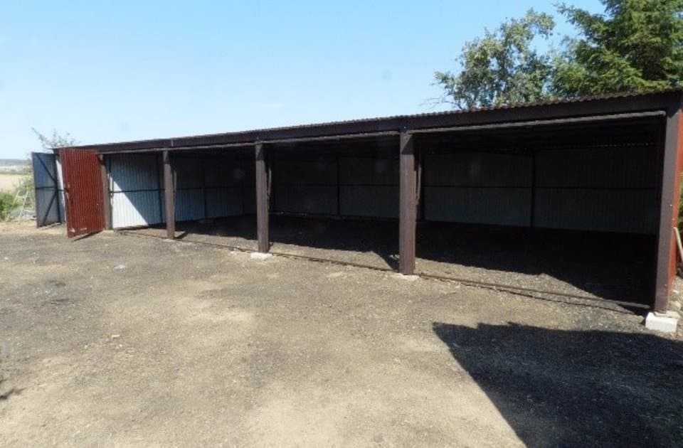 Plechová montovaná garáž 18×6 - hnědá